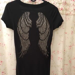 Gorgeous Winged double raw edge hemmed shirt.